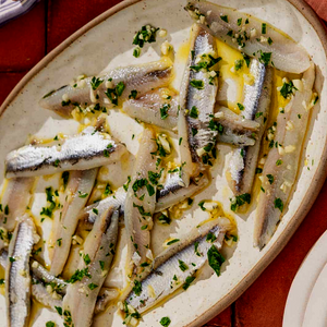 Spanish Boquerones marinated in vinegar, parsley, garlic